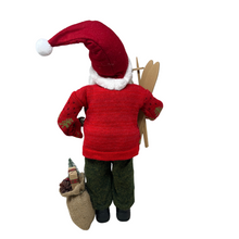 Load image into Gallery viewer, Red Sweater Santa with Ski&#39;s in Hand and Burlap with Presents
